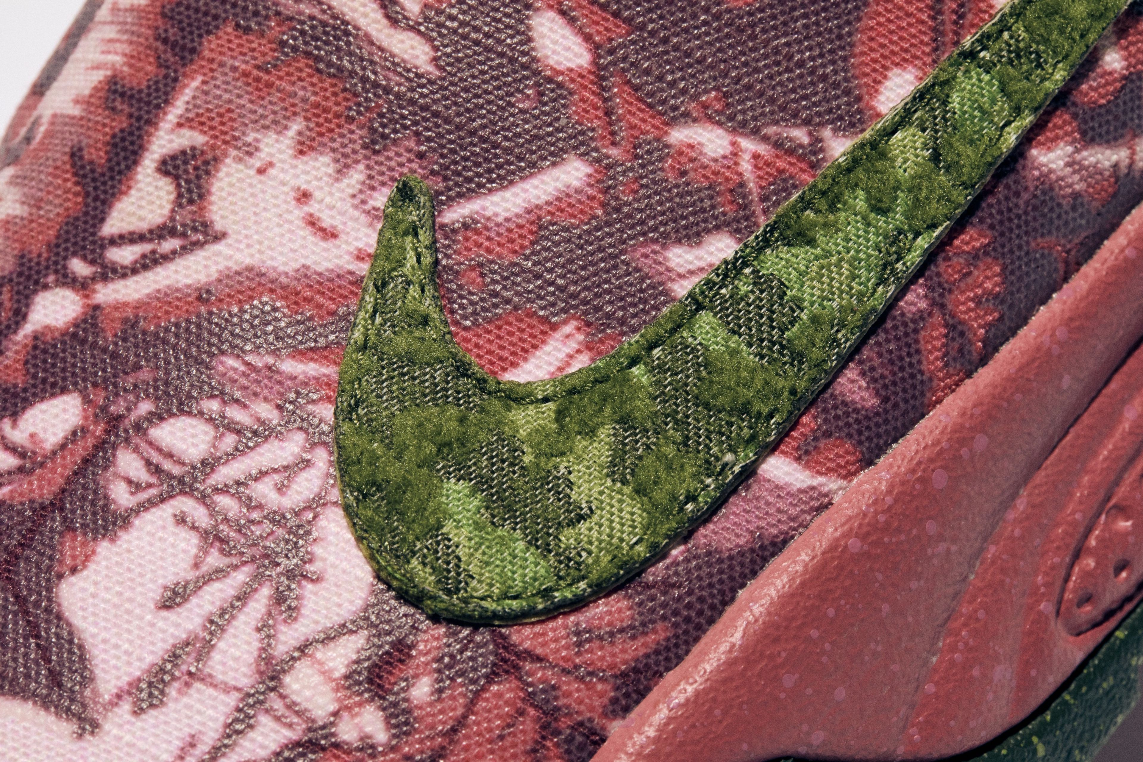 Close-up of a green textured Swoosh on the Nike ACG Rufus.