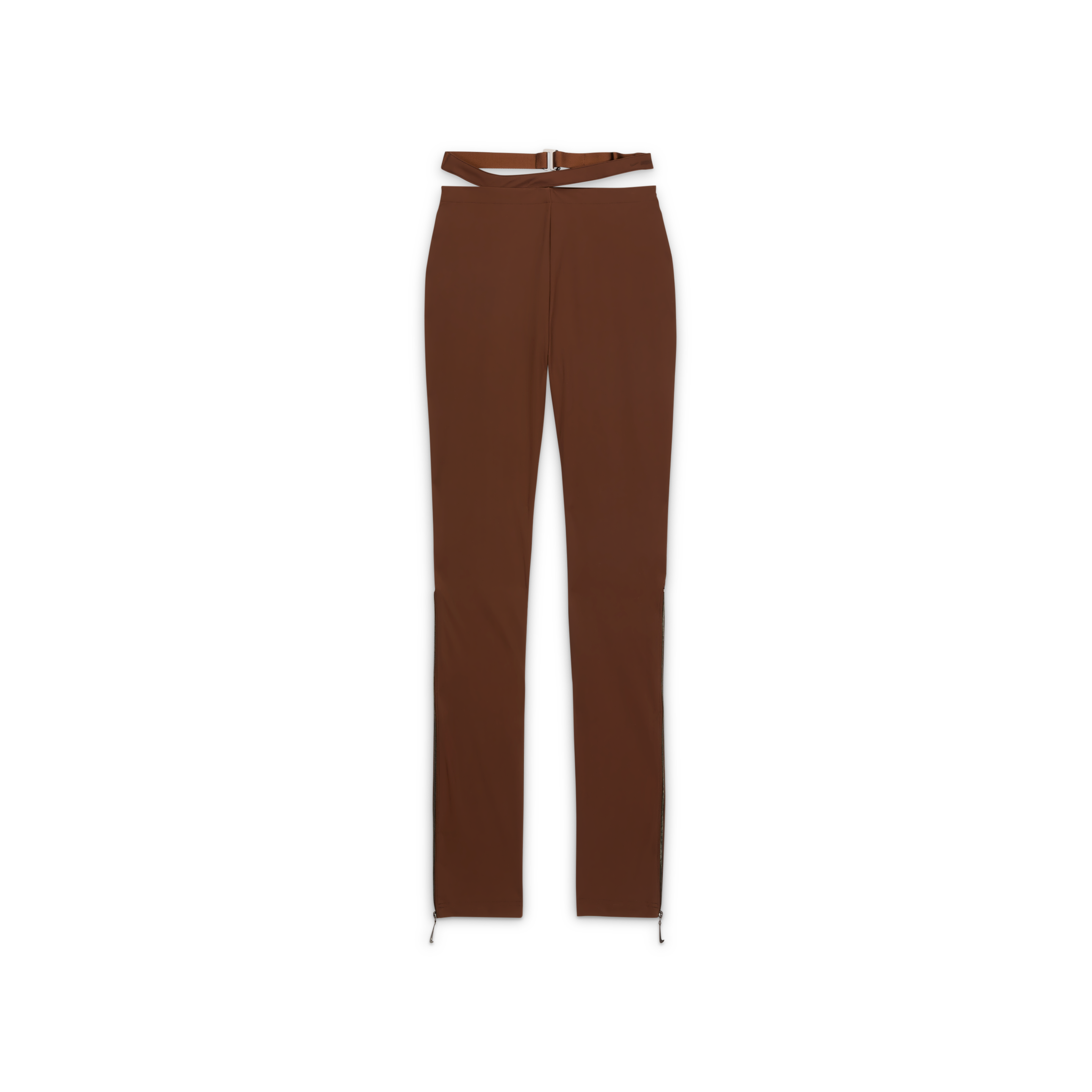 Overhead view of the Nike x Jacquemus Women's Pant in cacao wow brown. These form-fitting, stretchy pants includes zippers from the knee down, which have a silver zipper pull in the shape of a Swoosh. The strappy waistband is attached but separated from the waistband. The pant floats on a black background.