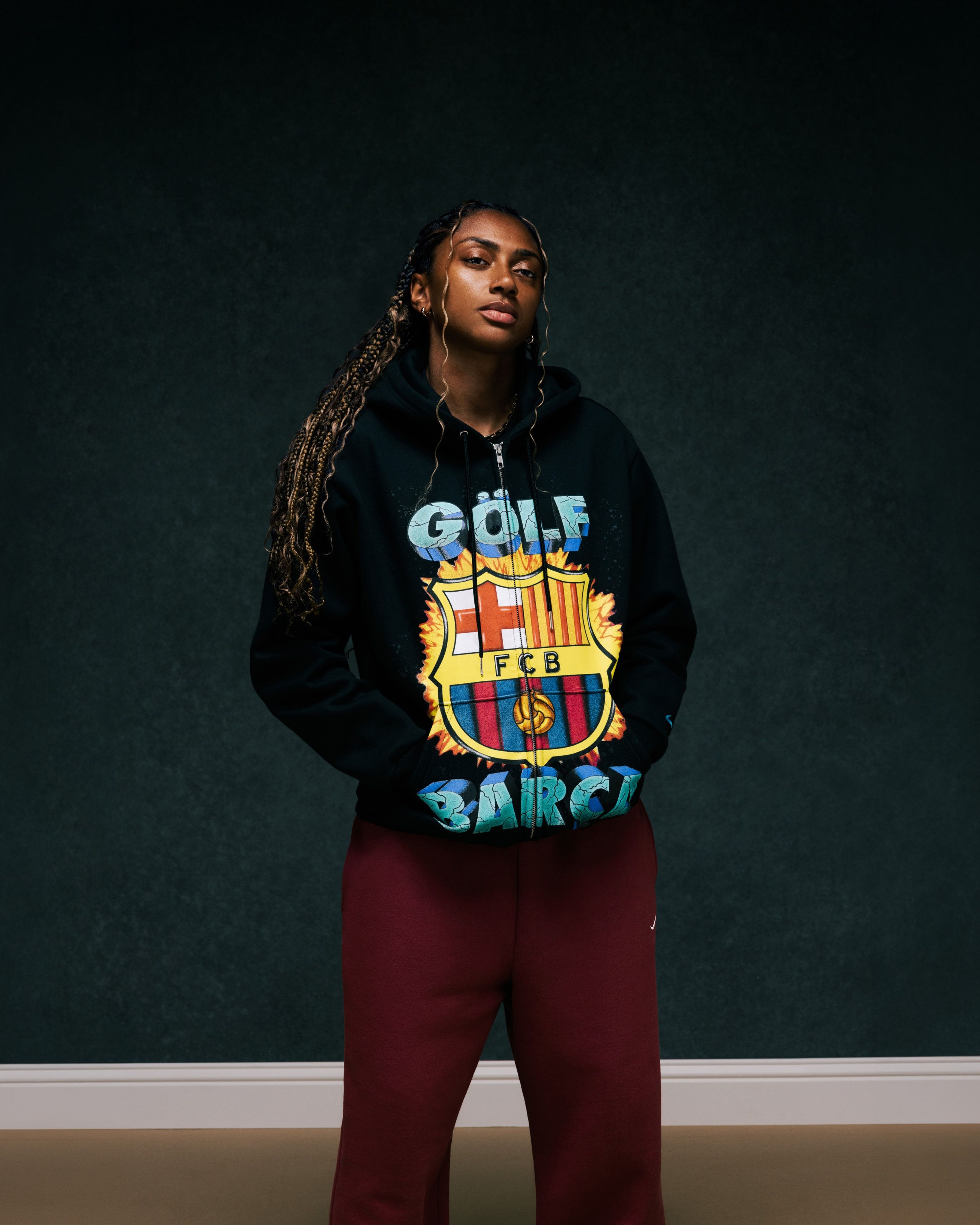 Person wearing clothing from the Nike x FC Barcelona x GOLF WANG (GOLF) collection.