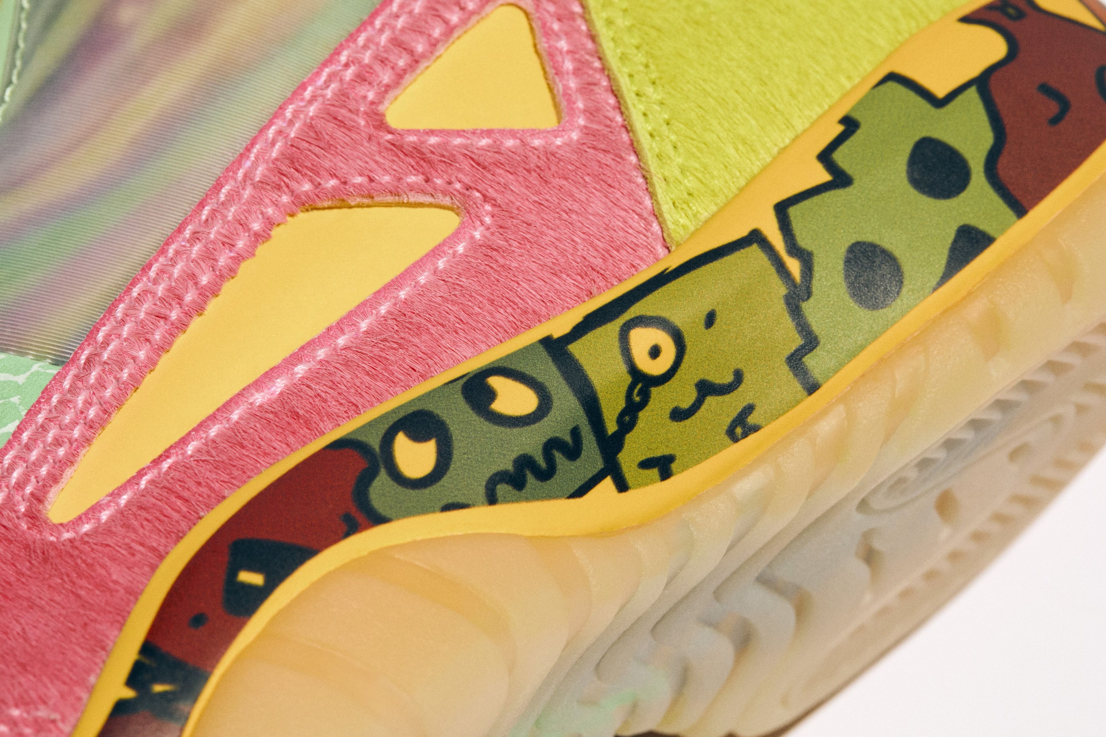 Aliens on Avery Wilson’s Air Jordan 11 Low IE.