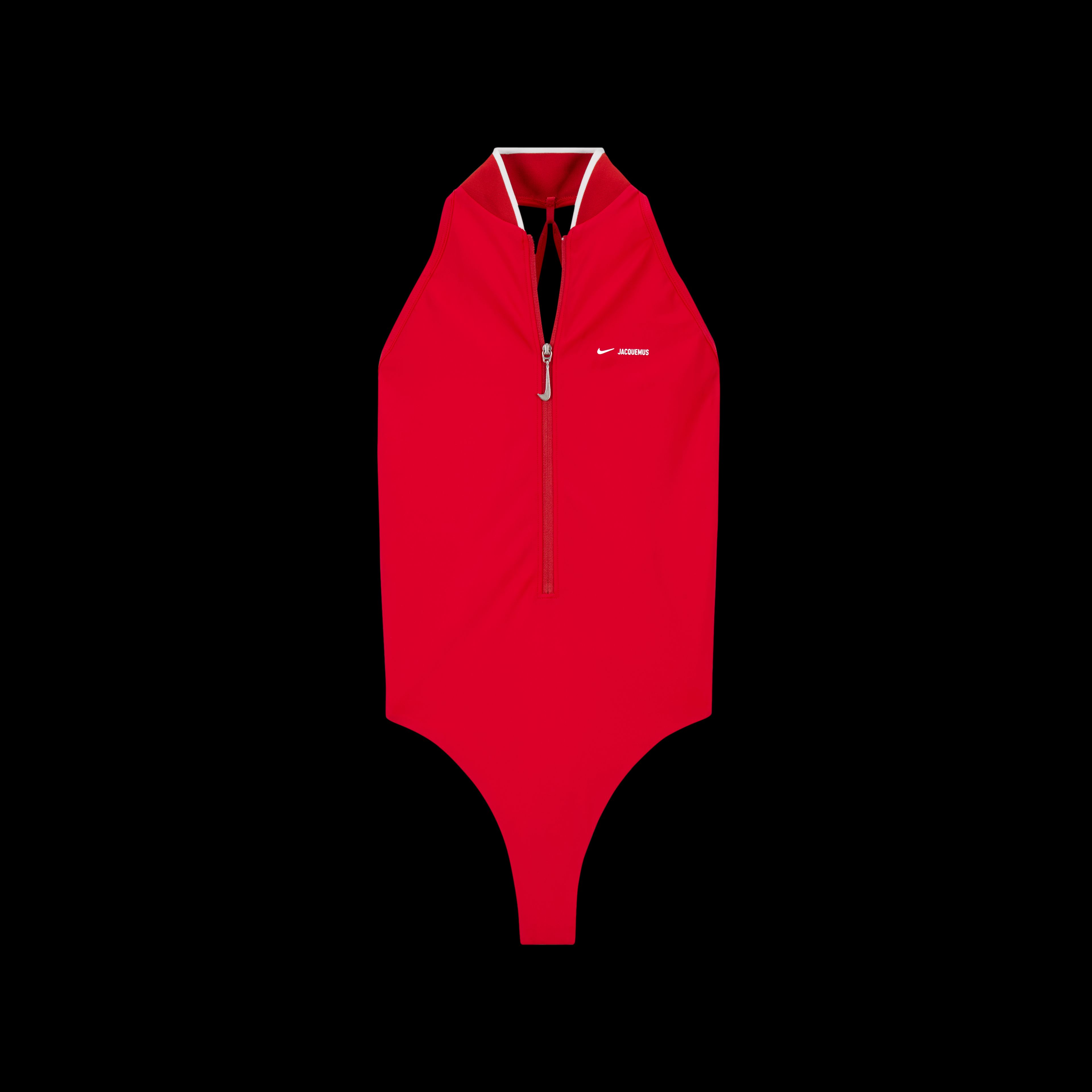 Overhead view of the Nike x Jacquemus High Neck One Piece Swimsuit in university red with white pinstripe at the collar edge. There is a zipper on the suit that runs half way up the piece, and uses a silver pull in the shape of a Nike Swoosh. The piece floats on a black background.