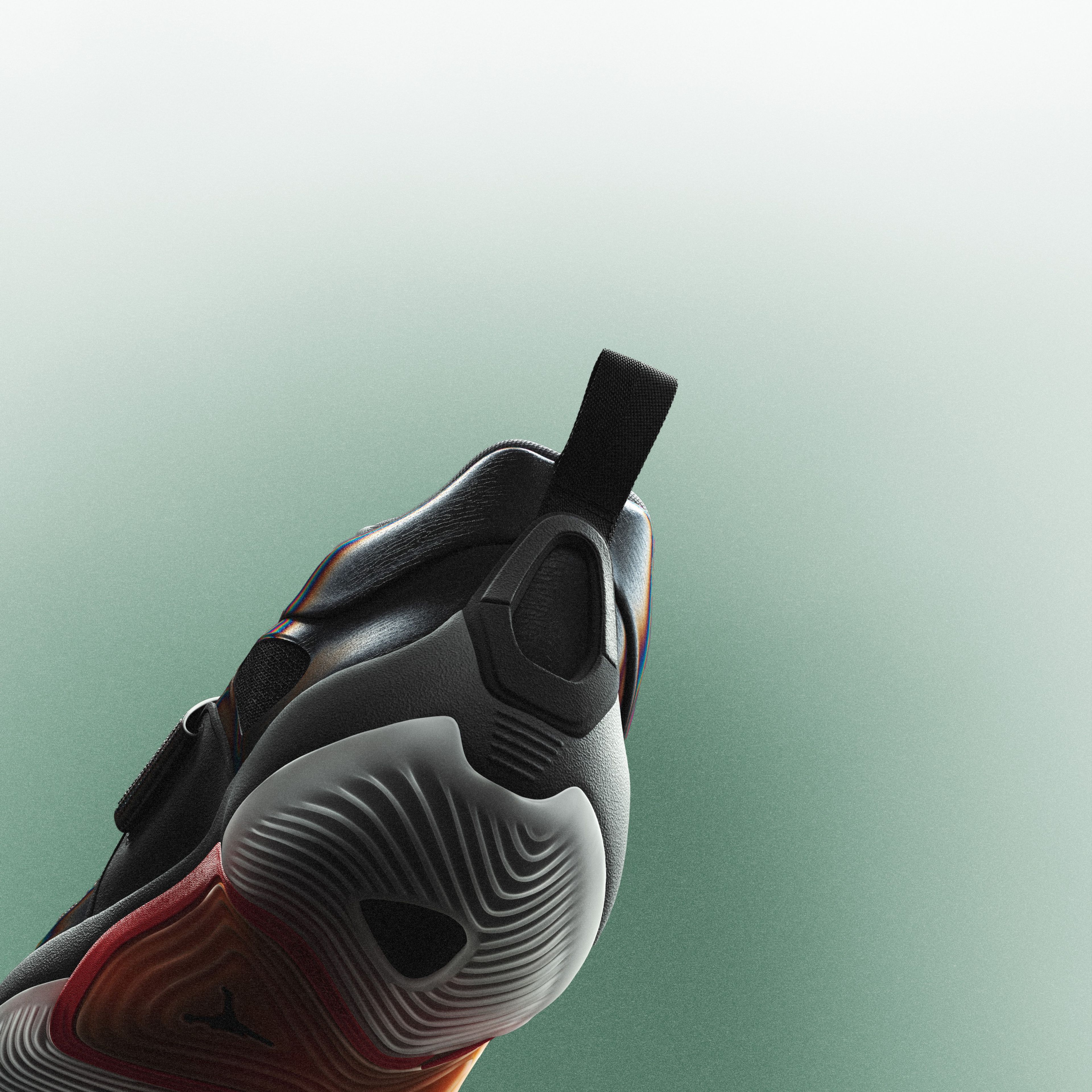 The heel of the Jordan Brand Tatum 5 is pictured against a green and white background.