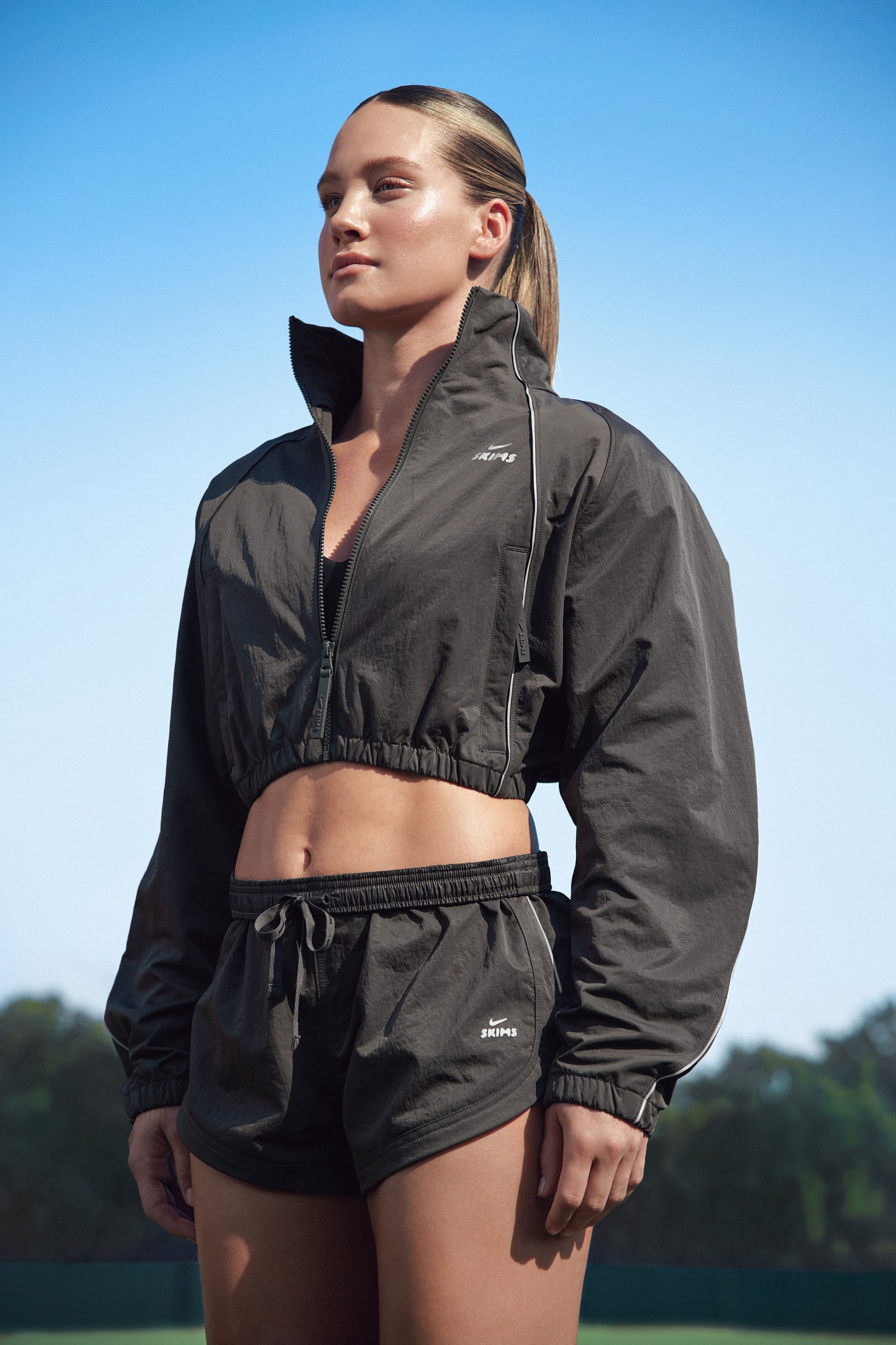 A University of Alabama cheerleader in NikeSKIMS apparel.