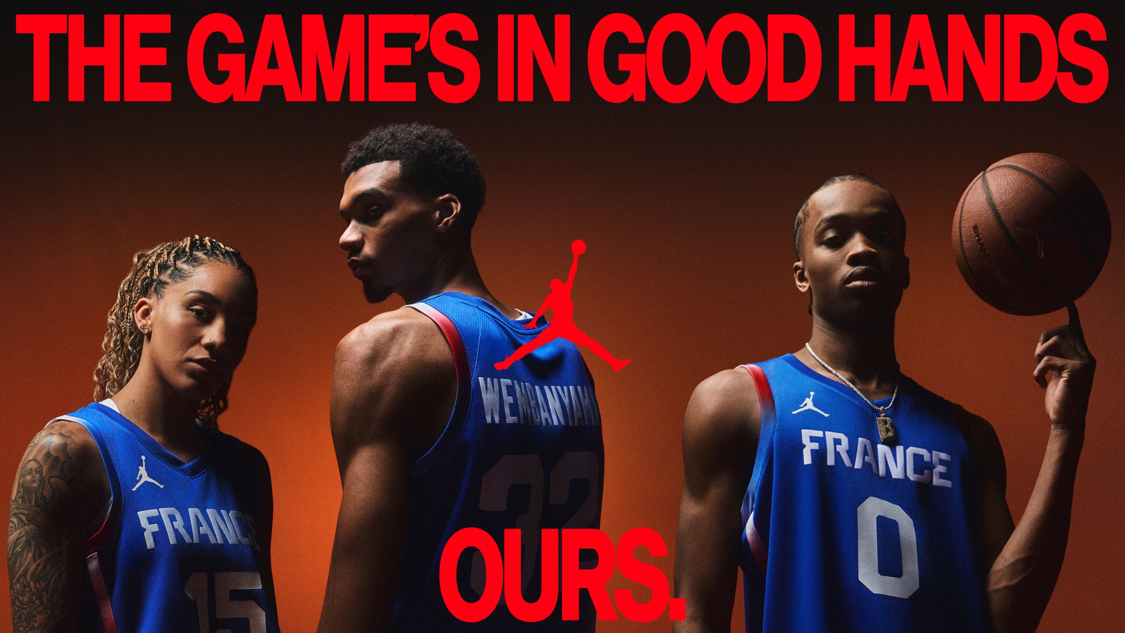 Three basketball athletes wearing blue Air Jordan jerseys face the camera at various angles with serious expressions. A caption in red font reads, "The game's in good hands. Ours." The Air Jordan logo is in the center.