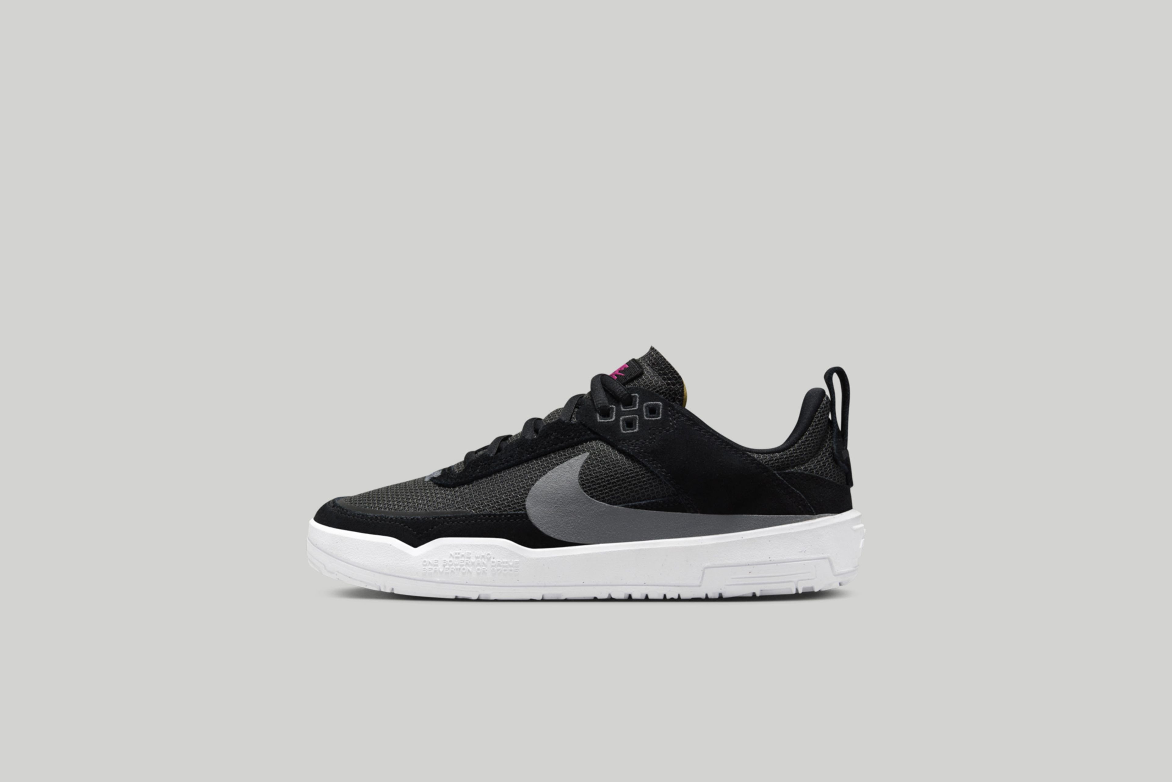 Left view of the kids Nike SB Day One in black.