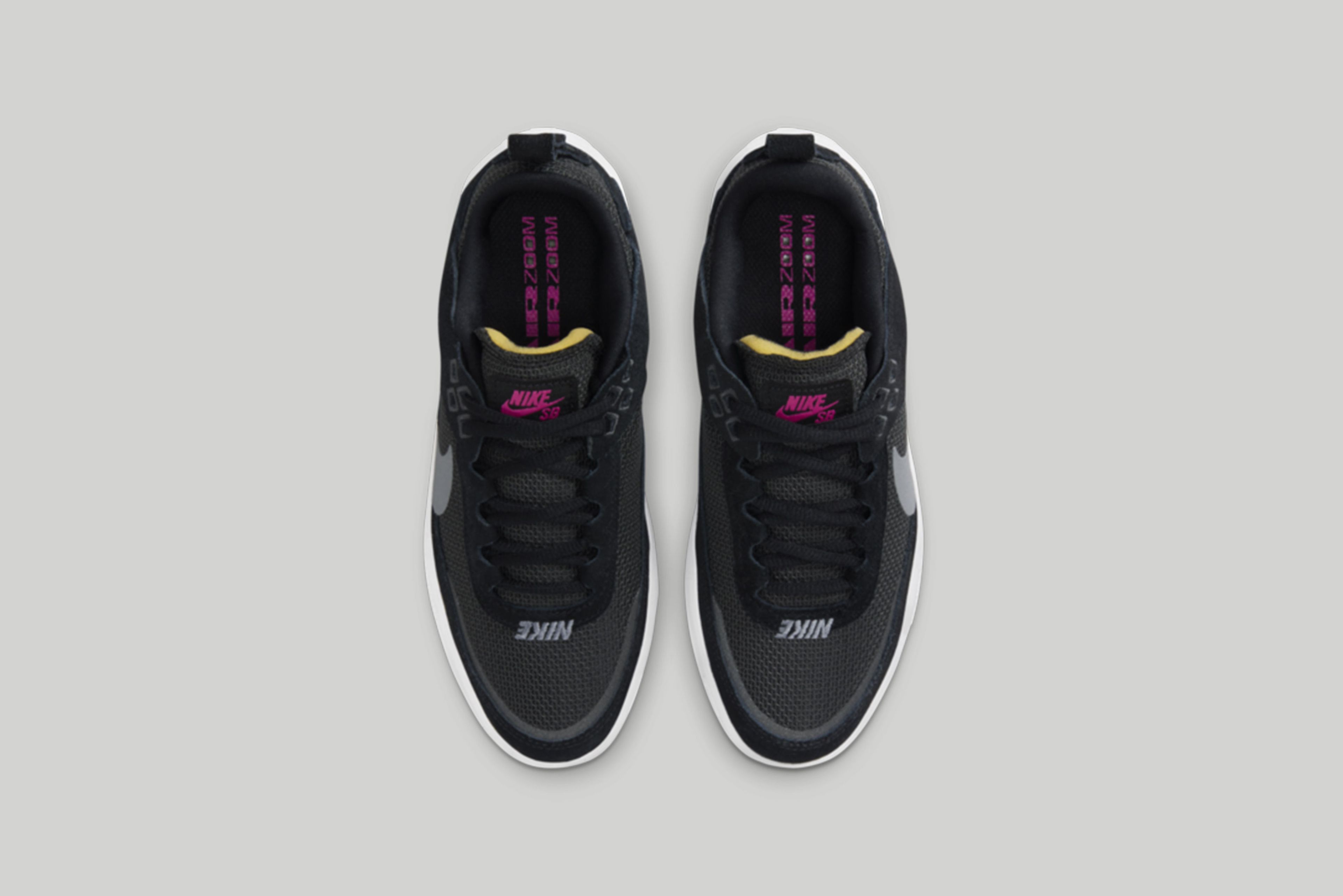 Overhead view of the kids Nike SB Day One in black.