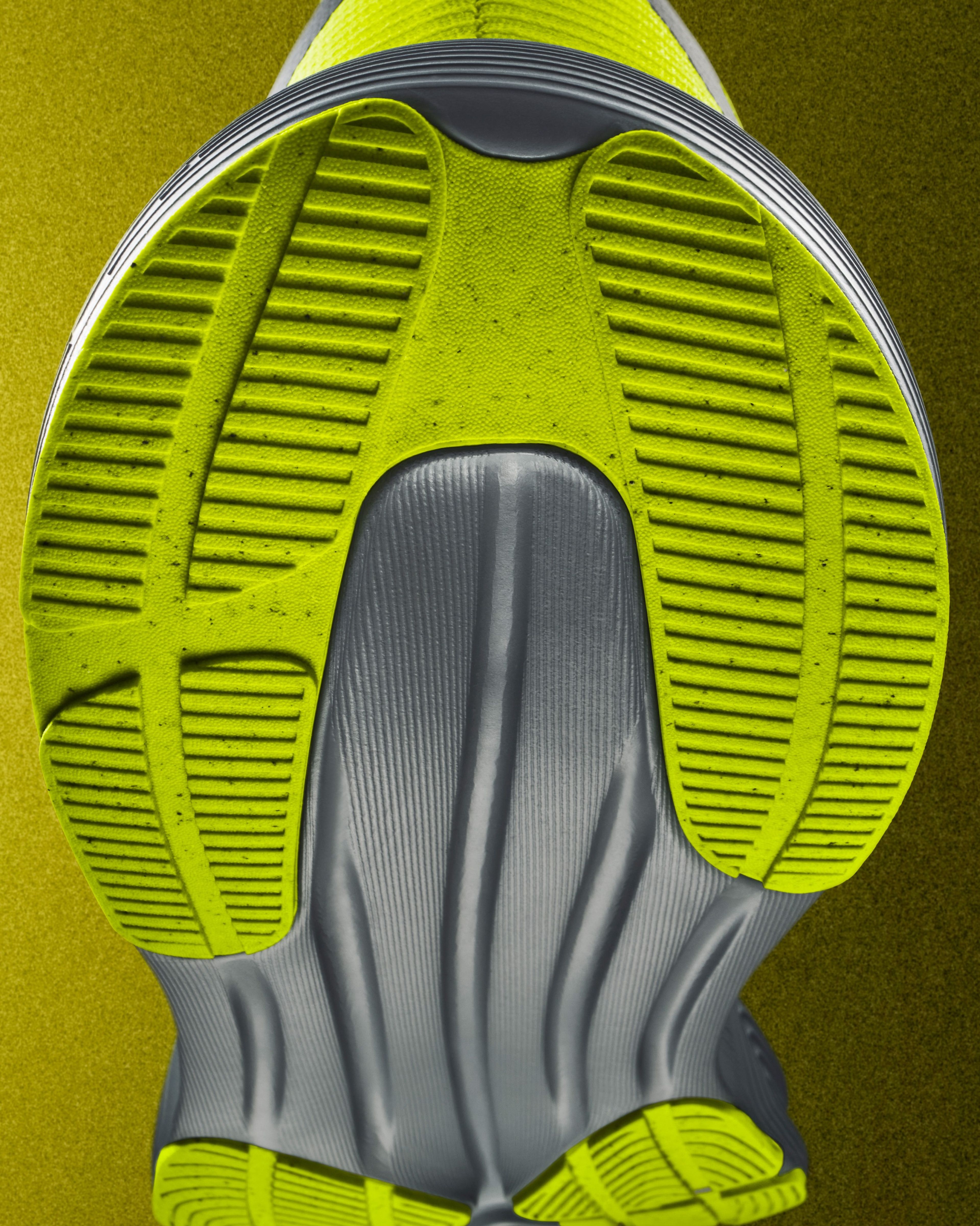 Close-up of a bright green Nike Vegas Run shoe