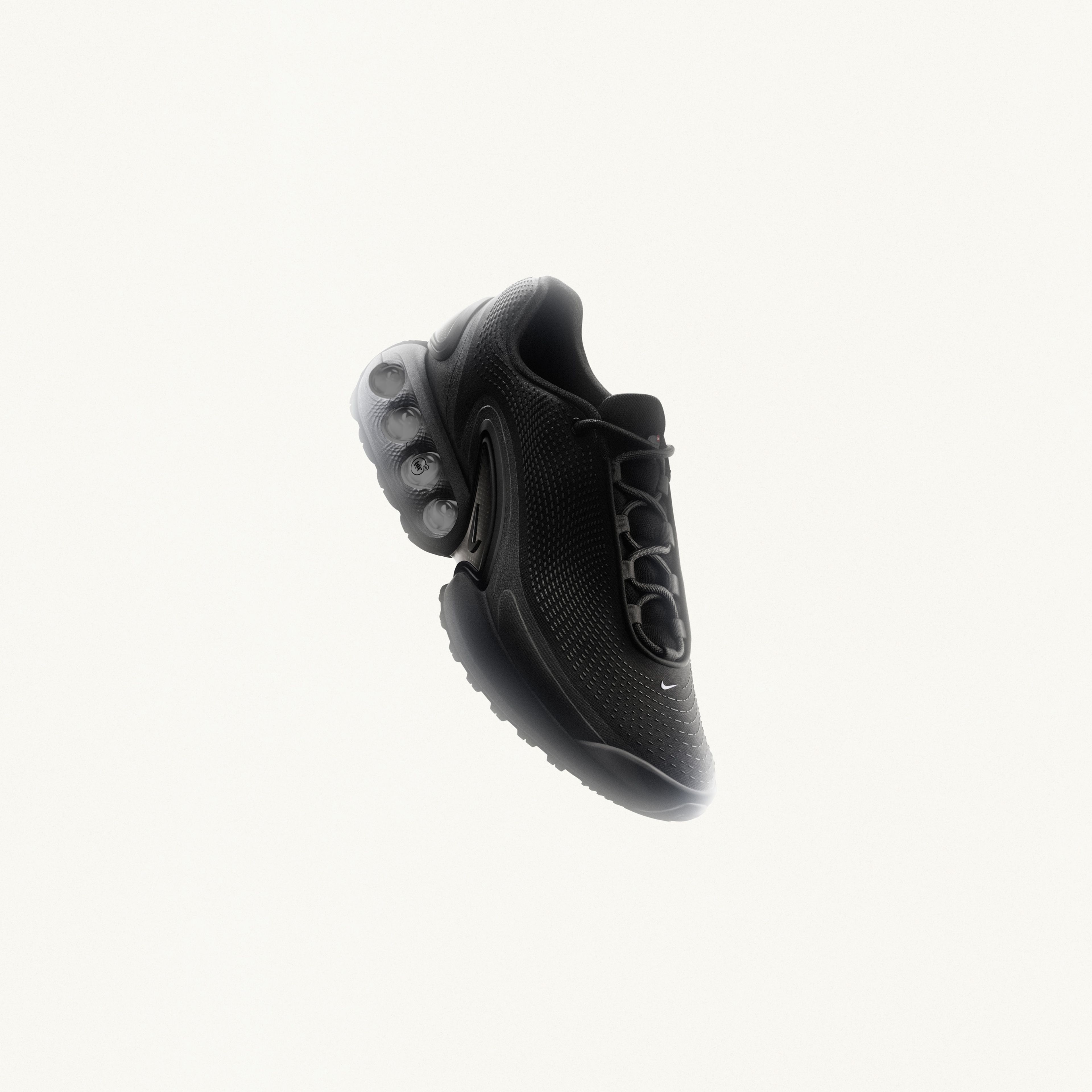 Front angled view of the Nike Air Max Dn in the black color way