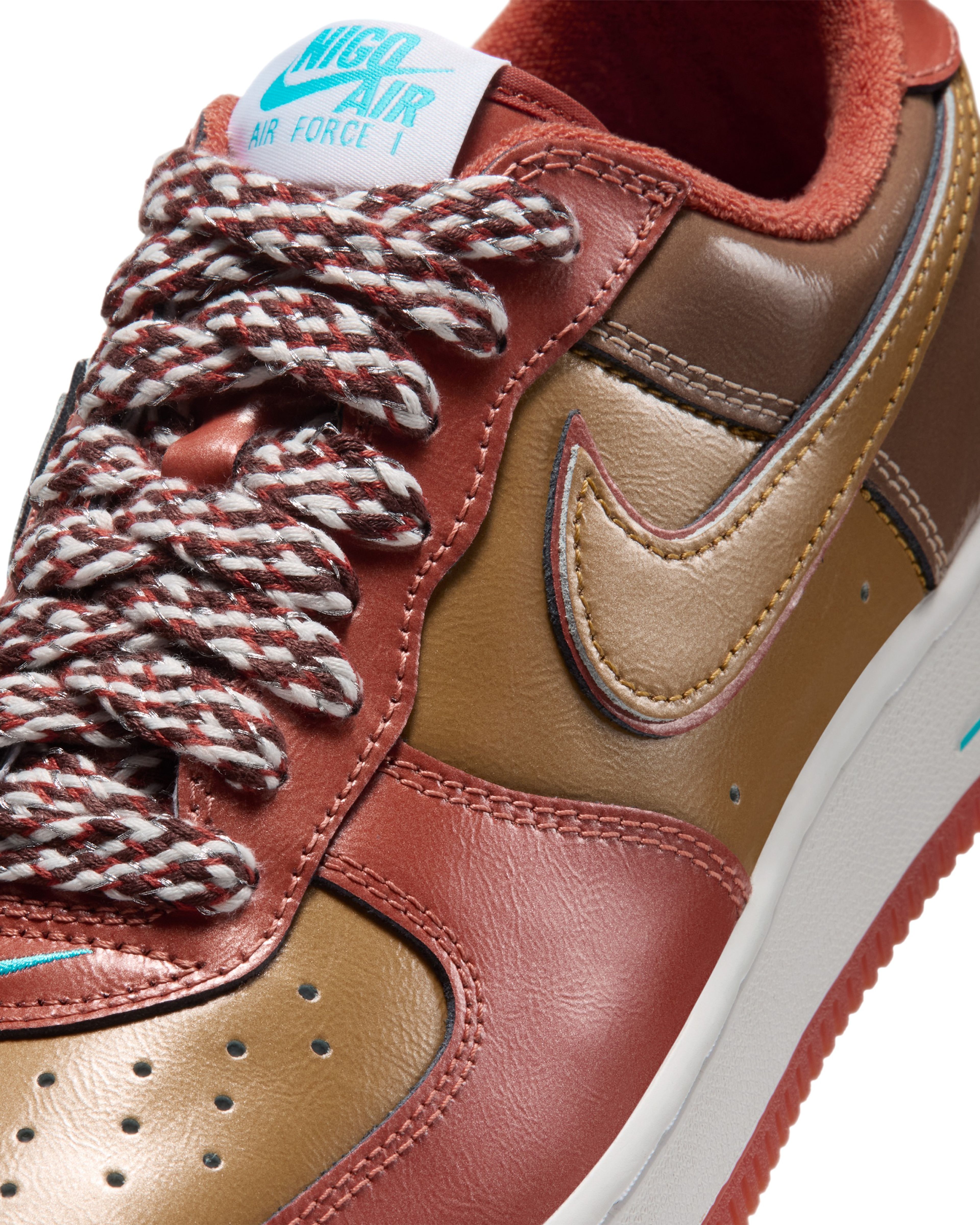 Nigo and j-hope’s reimagined Nike Air Force 1 features a glossy Burnt Sunrise and Metallic Gold leather upper, Chlorine Blue accents and signature squirrel graphics.
