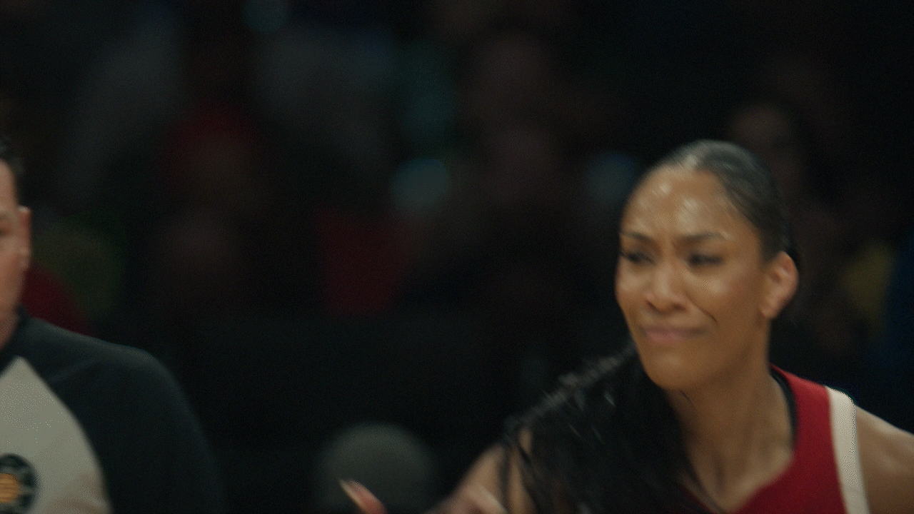 Video look of Aja Wilson saying "Nah" and shooing away a competitor on the court. She wears a red Team USA basketball jersey.